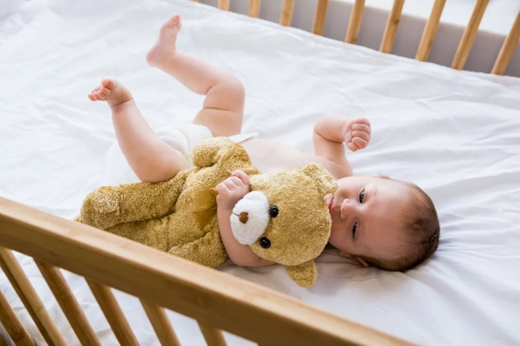 Em bé sơ sinh không bắt buộc nằm gối